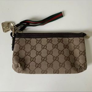 Authentic Gucci Beige GG Canvas Wristlet Pochette